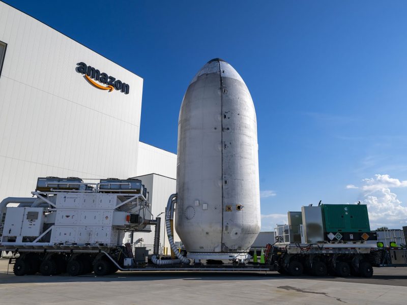 Amazon Leo satellites leaving Amazon’s payload processing facility in August. With Blue Origin’s TeraWave announcement, industry insiders wonder if Amazon and Blue Origin could ultimately compete for launch spots, a notion Blue Origin dismisses. Credit: Amazon