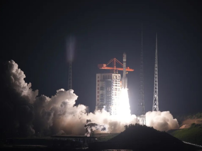 A Long March 6A rocket lifts off at night from Taiyuan Satellite Launch Center in northern China, sending a batch of Guowang broadband satellites into orbit. Bright exhaust and thick clouds of smoke billow around the launch pad against the dark sky.