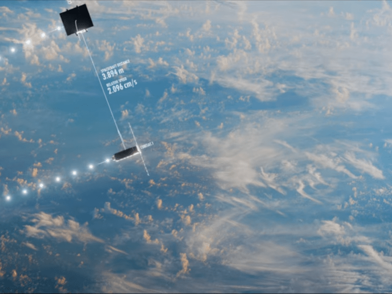 A screenshot from ClearSpace's promotional video for PRELUDE, showing two spacecraft maneuvering near each other in orbit. Credit: ClearSpace